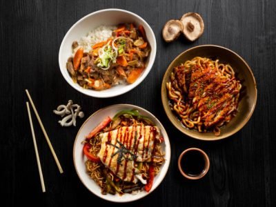 Table with typical Japanese food seen from above.